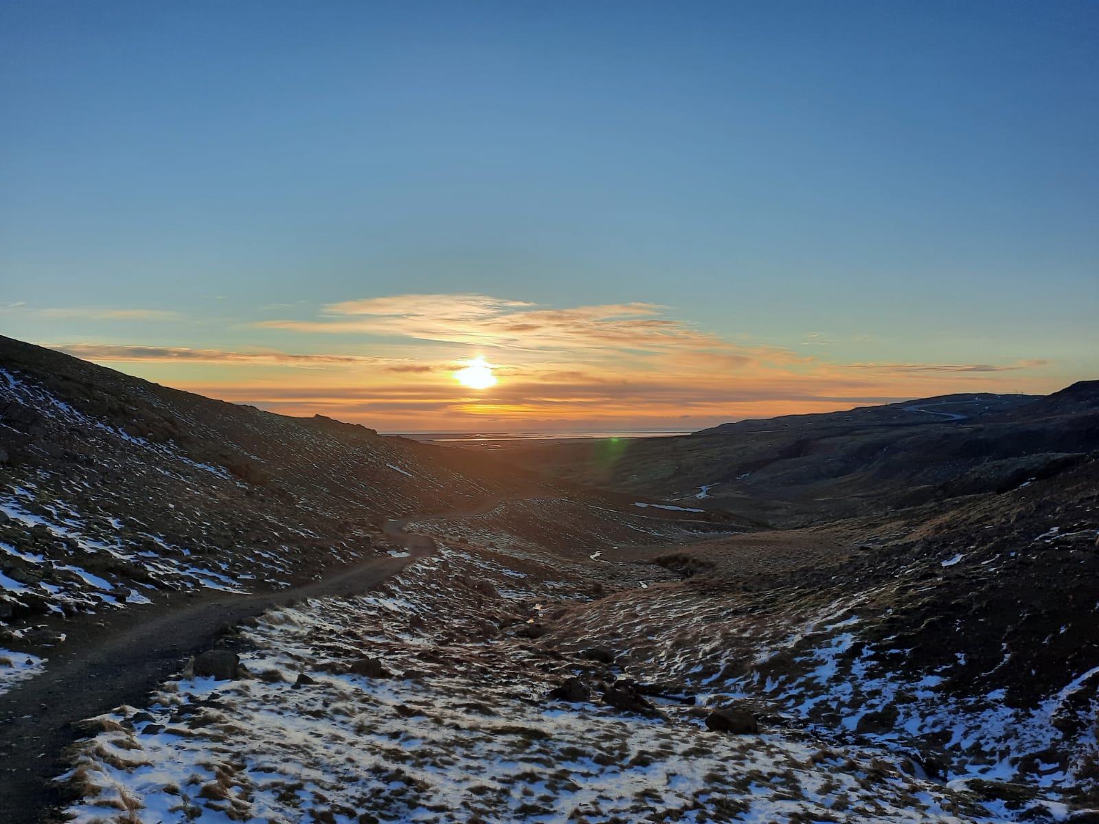 Solnedgång från ett mindre berg